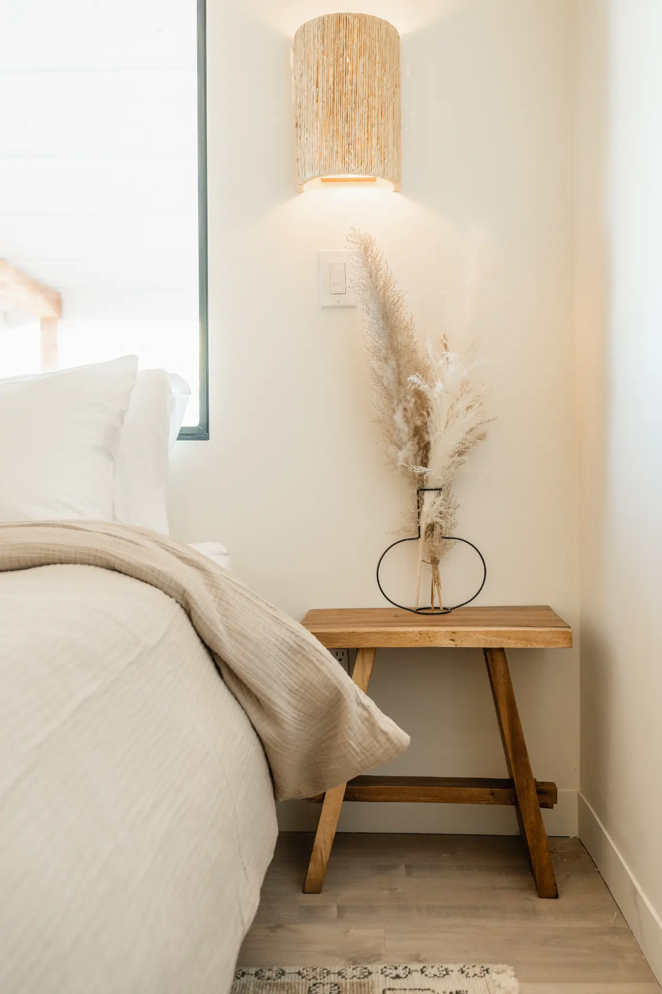 Bedroom with warm desert tones and curated furnishings