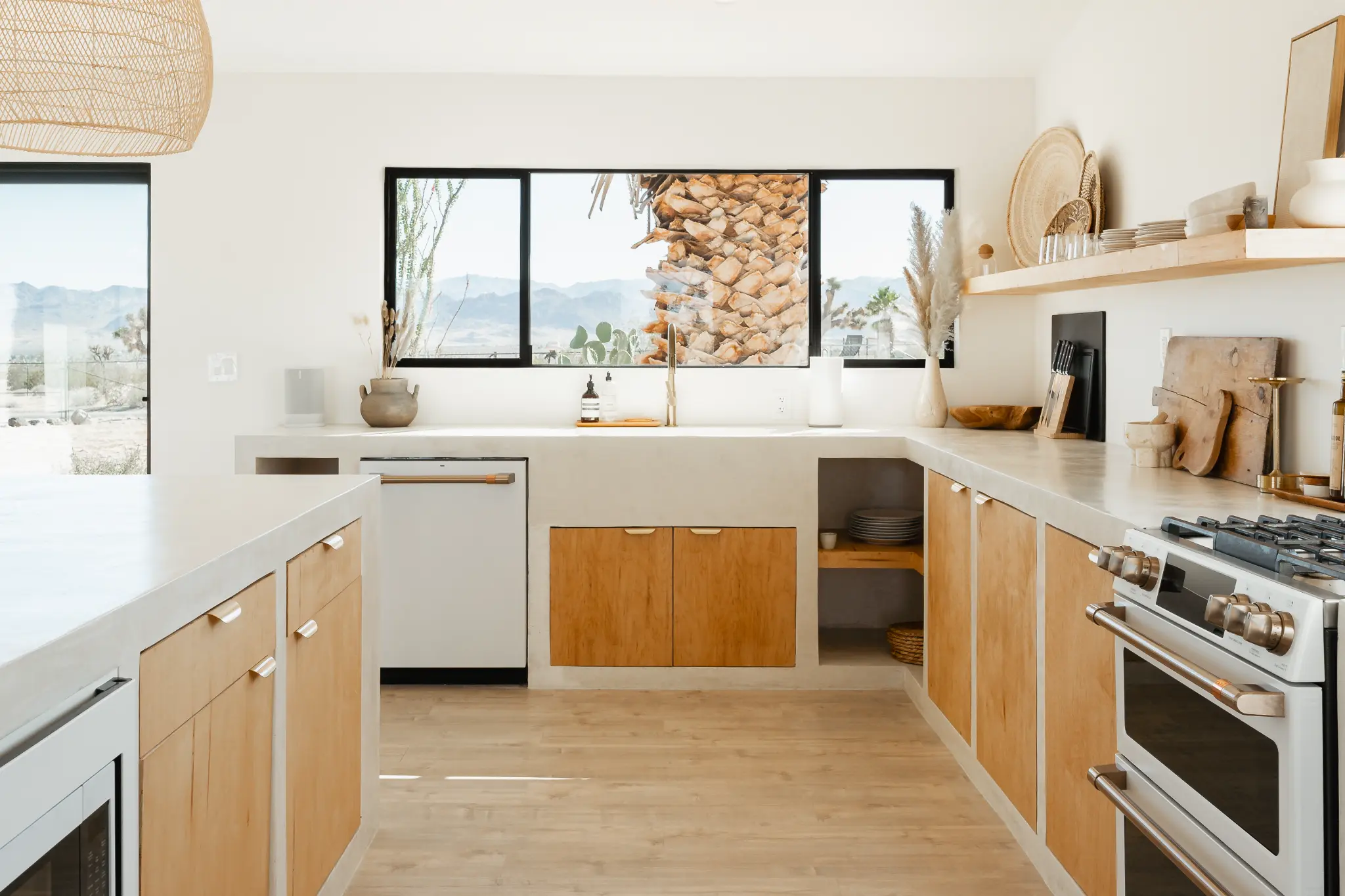 Open-plan kitchen and dining with dramatic natural light